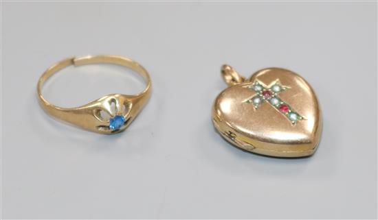 A yellow metal and gem set heart shaped pendant locket and a yellow metal ring.